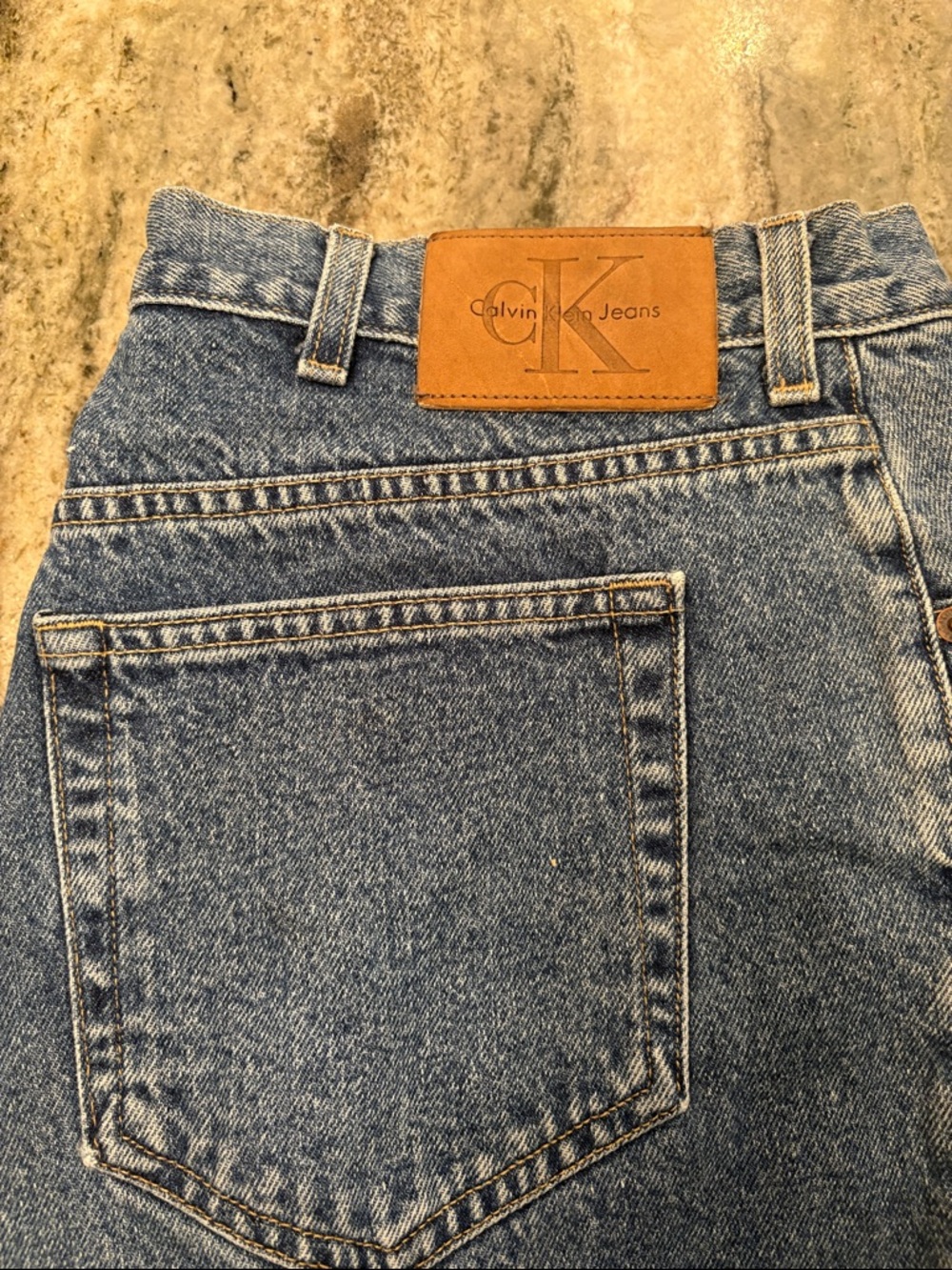 Calvin Klein Relaxed Fit Light Blue Denim Jeans with Leather Patch